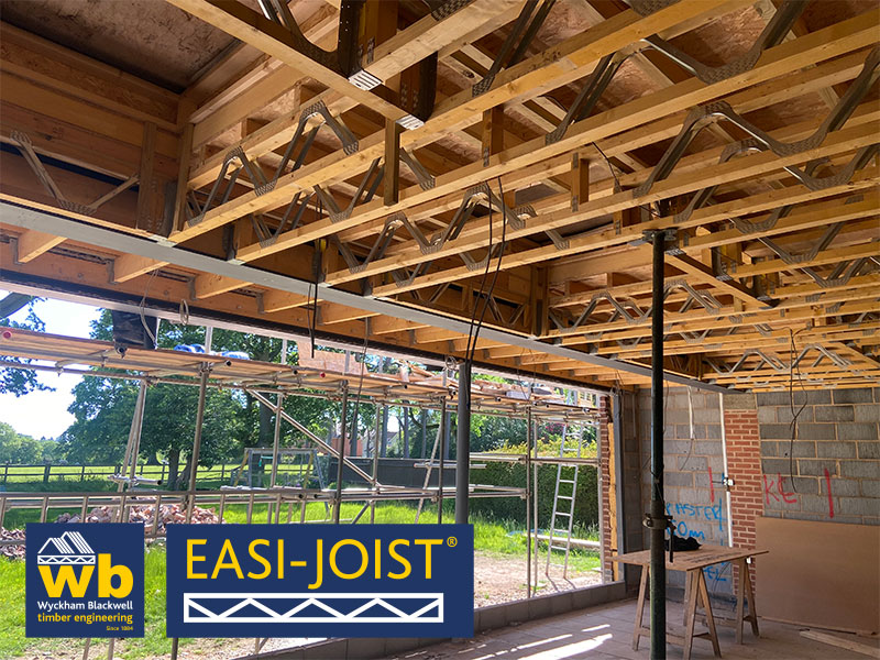 Complex Easi-Joist Metal Web Flat Roof Extension with Openings for Rooflights and Step up to hide Glazing Channel all supplied 100% On Time In Full