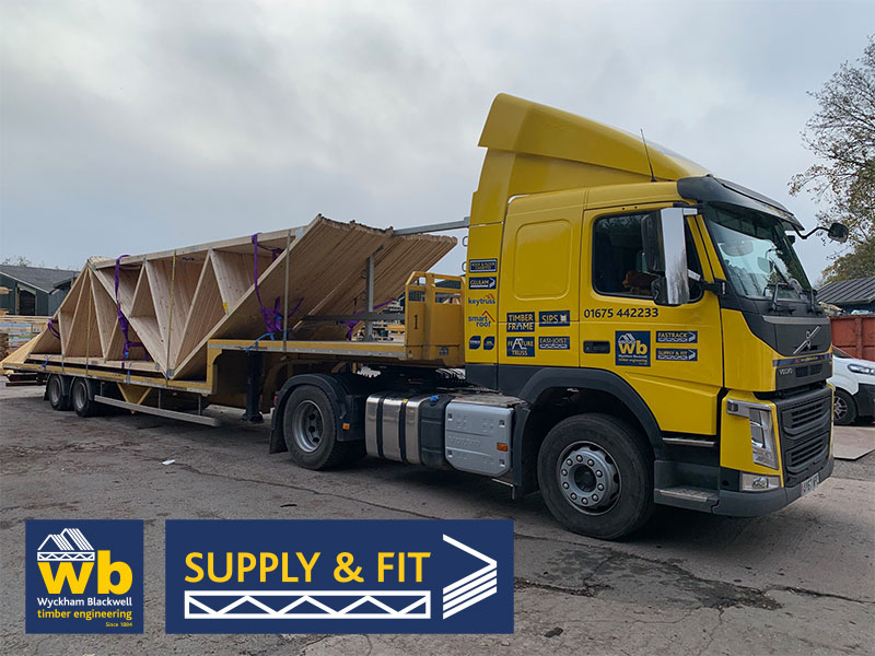 A full load of Fink Back to Back Trusses to create a Hidden Gutter all loaded ready for the install of a New Assisted Living Care Home Roof in Coventry