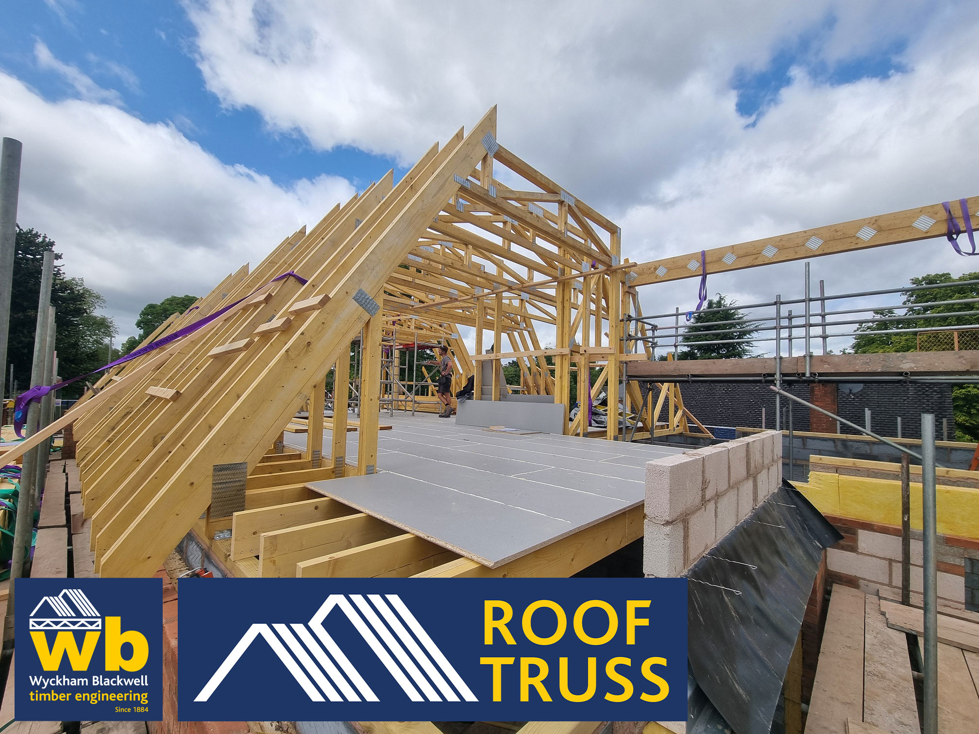 11m Span Dual Pitch Flat Top Trusses being installed this week on a new house development in Dorridge.