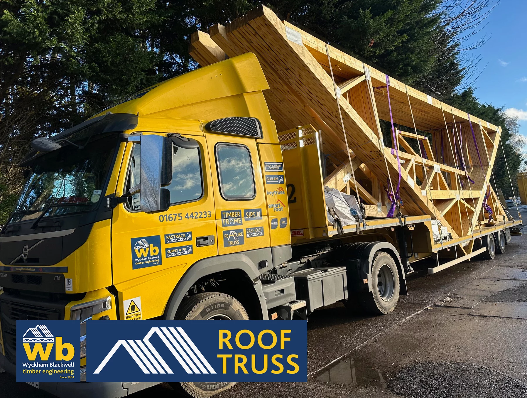 14.5m Long Span Attic Trusses all Loaded Inverted to allow 4.1m height for Delivery this week 100% On Time In Full for a new Care Home in Derby