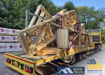 Roof trusses on back of flat bed lorry