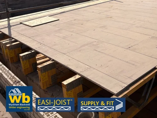 Rows of Easi-Joist Metal Web Joists under boards. 